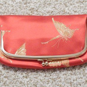 Red butterfly clutch